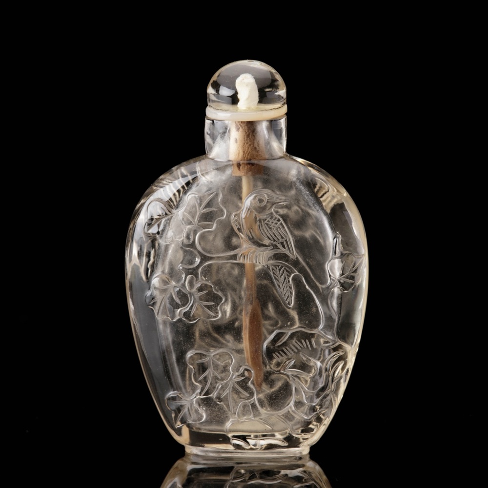 A carved citrine snuff bottle