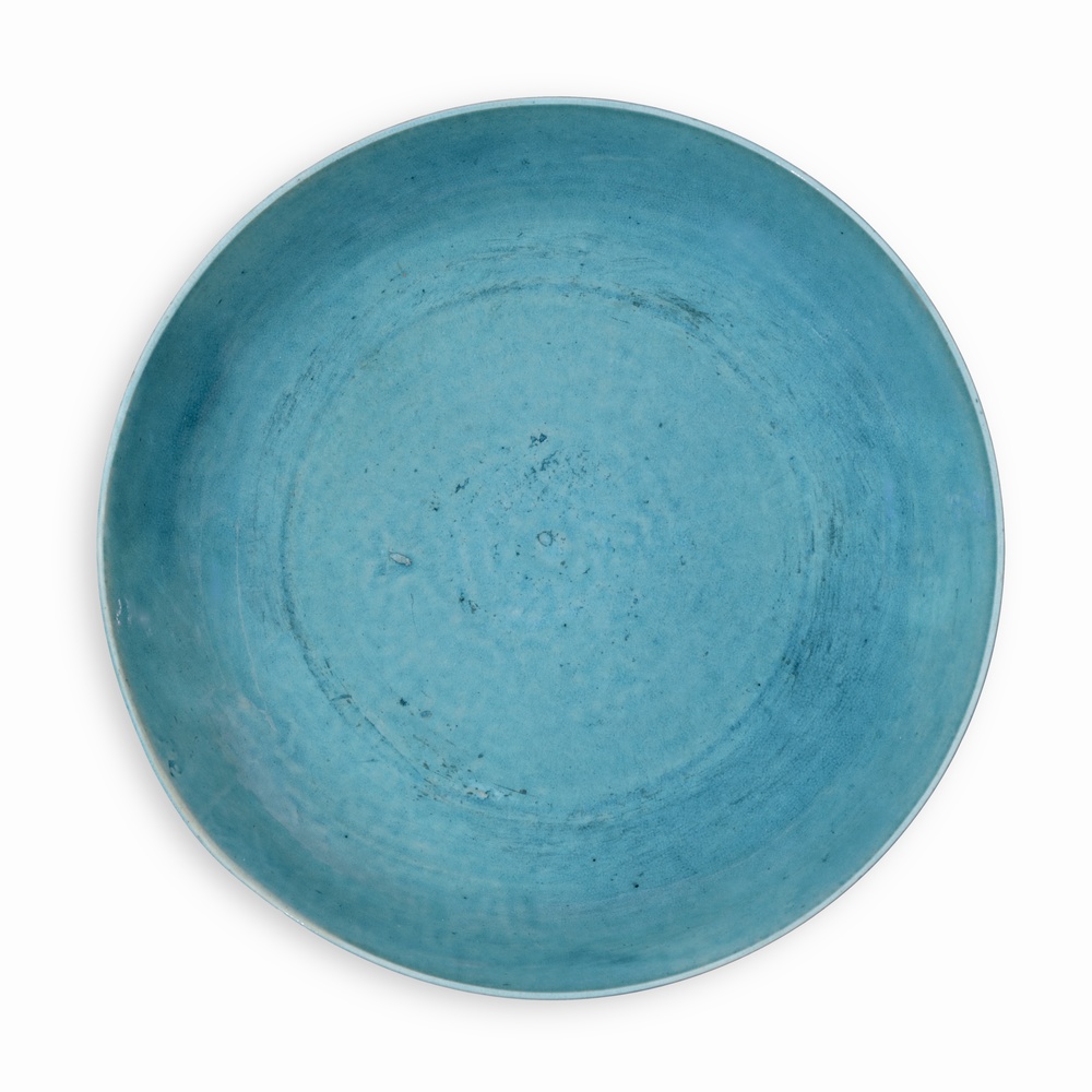 A turquoise-glazed dish