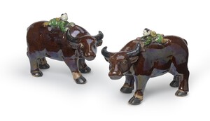 PF 30 A Pair Of Famille-Verte Biscuit Figures Of A Boy On A Buffalo<br><br>清康熙 素三彩牧童臥牛 一對