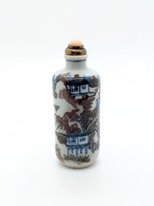 S 47 A blue and white and copper red snuff bottle