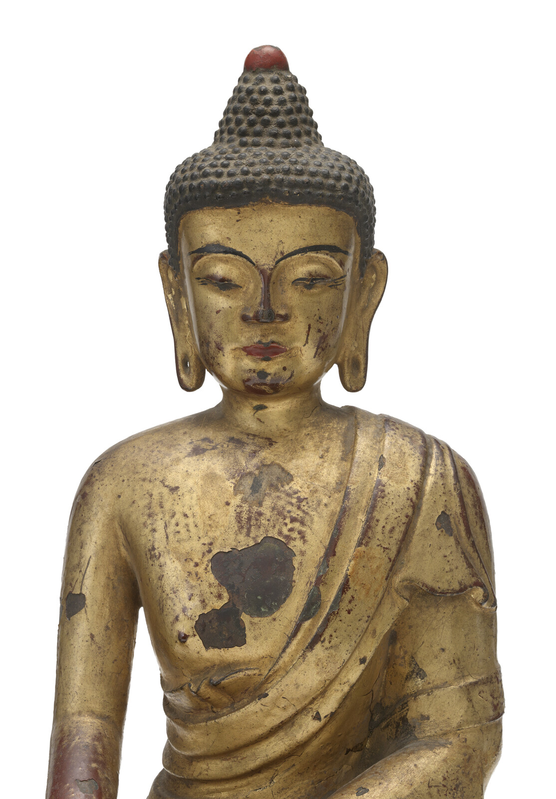 WF 21 A gilt and lacquered bronze figure of Shakyamuni Buddha<br><br>明十六世紀 銅鎏金髹漆釋迦牟尼佛坐像