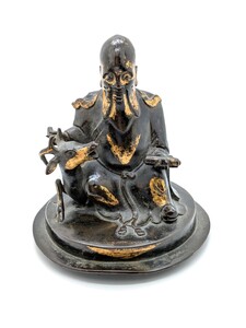 WF 50 A parcel-gilt bronze group of Shoulao and deer<br><br>十七或十八世紀 銅局部鎏金壽老騎鹿像