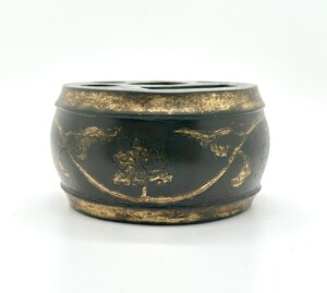 WF25 A rare gilt bronze brush- and ink stick holder